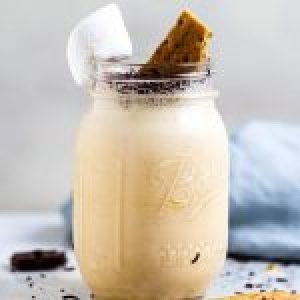 A large glass of s'mores milkshake recipe.