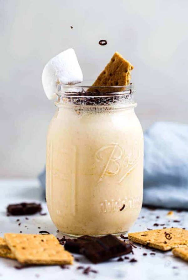 A large glass of s'mores milkshake recipe.