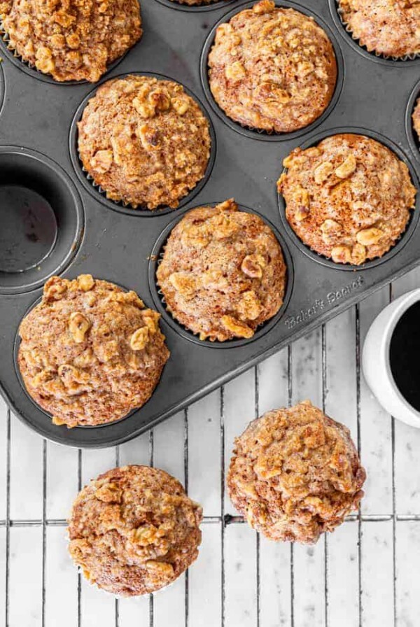 Pumpkin muffins in a baking pan.