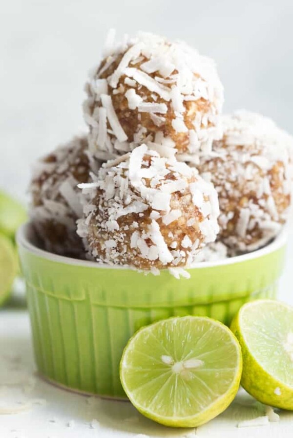 Key Lime Coconut Energy Bites are made with five tasty ingredients and come together in less than 5 minutes! They are vegan, gluten free and paleo-friendly.