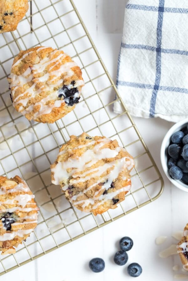 Blueberry Coffee Cake Muffins combine the best of blueberry muffins and coffee cake muffins with a sugar drizzle!