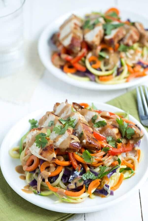 Thai Chicken Noodles with zucchini noodles, carrot noodles, cabbage, red bell pepper, soy-ginger chicken and peanut dressing!