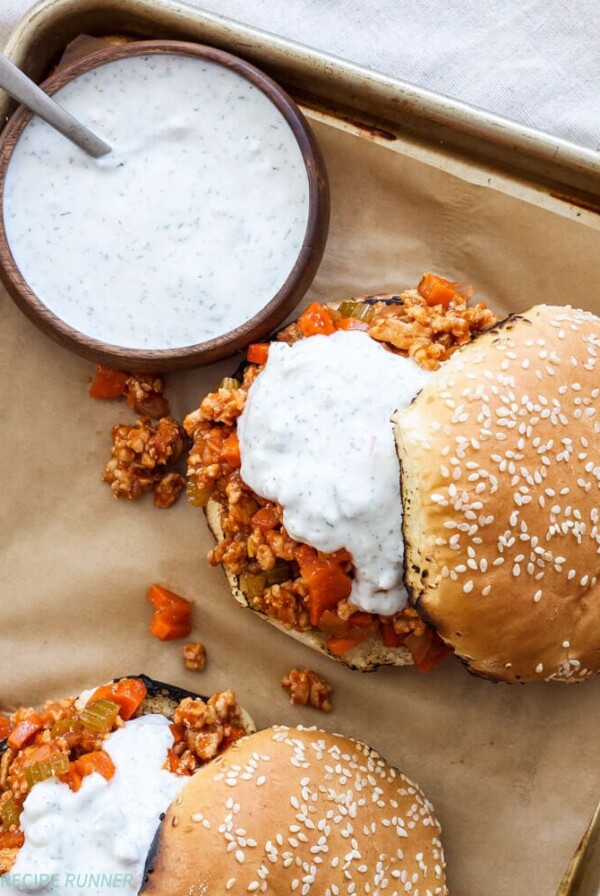 Buffalo Chicken Sloppy Joes | Buffalo wing sauce fans will love these easy to make buffalo chicken sloppy Joes topped with blue cheese ranch sauce!