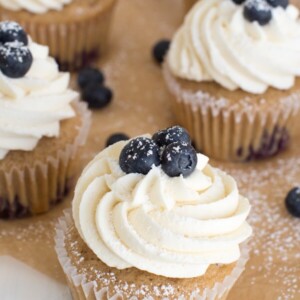 Blueberry French Toast Cupcakes are irresistible! A cinnamon maple cake is topped with maple buttercream frosting and fresh blueberries.