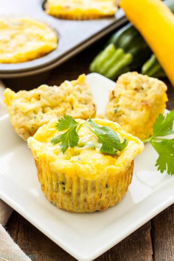 Cheesy Zucchini Quinoa Egg Muffins | Skip the drive-thru egg muffins and make these healthy, freezer friendly, Cheesy Zucchini Quinoa Egg Muffins! Full of protein and carbs they're the perfect way to start the day!