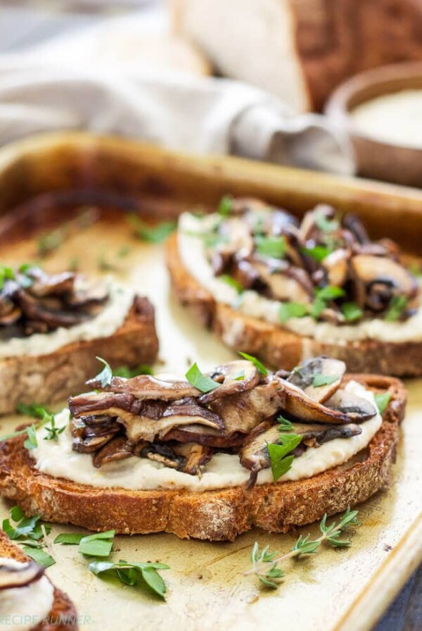 Lemon Rosemary White Bean Toasts with Mushrooms | Creamy white beans spread on crunchy whole grain toast and topped with a sautéed blend of mushrooms. They’re great for any meal or an afternoon snack!