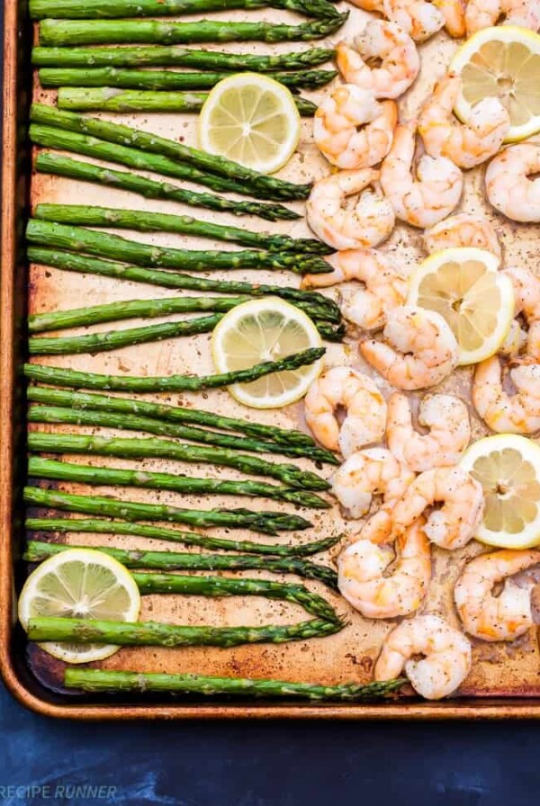 Sheet pan Lemon Roasted Shrimp and Asparagus with Herbed Couscous is one of the easiest dinners I've made and It's full of gourmet flavor! It can be on the table in 15 minutes or less!