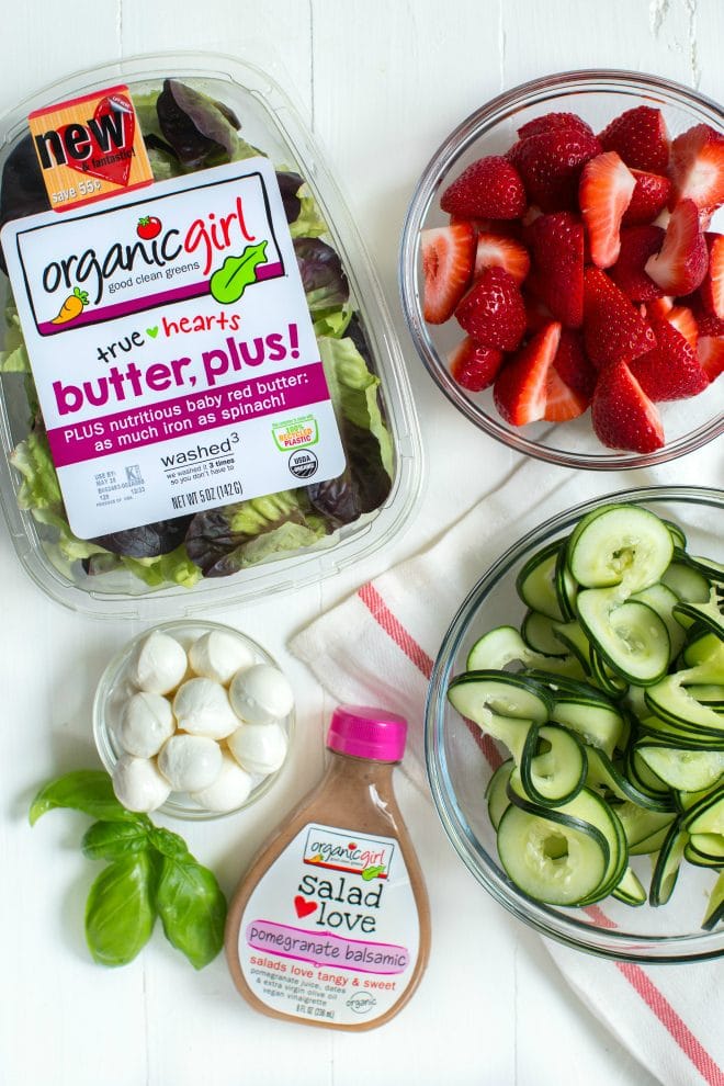 Strawberry, Cucumber and Mozzarella Salad is made with only five ingredients including a flavorful pomegranate balsamic dressing! Enjoy as a side or main dish for summer or all year long. 