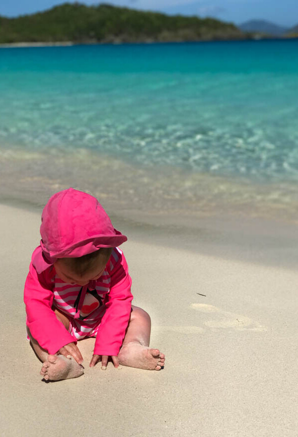 Are you planning a trip with your small children to St. John, U.S. Virgin Islands? Read my guide for traveling with a baby or toddler to St. John, U.S. Virgin Islands including tips for flying with small children, packing and more!