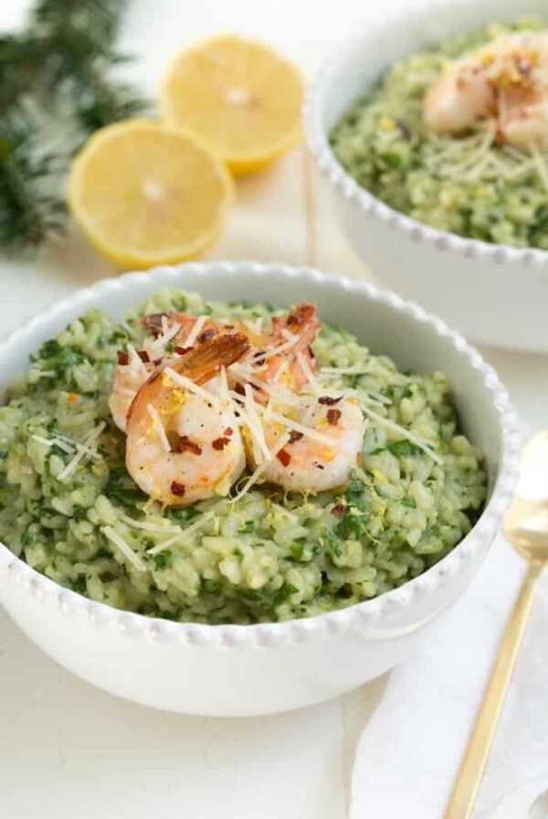 Lemon Garlic and Spinach Risotto with Sautéed Shrimp is a classic recipe that combines everything you love about creamy risotto with lemon garlic and hearty spinach. The creamy risotto is topped with a simple sautéed lemon garlic shrimp to create an entire meal for any day of the week!