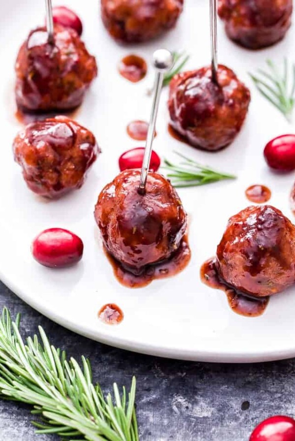 Every party needs a good meatball and these Rosemary Turkey Meatballs with Cranberry Balsamic Sauce are sure to be a crowd pleaser this holiday season! #meatballs #appetizer #turkey #cranberry #glutenfree