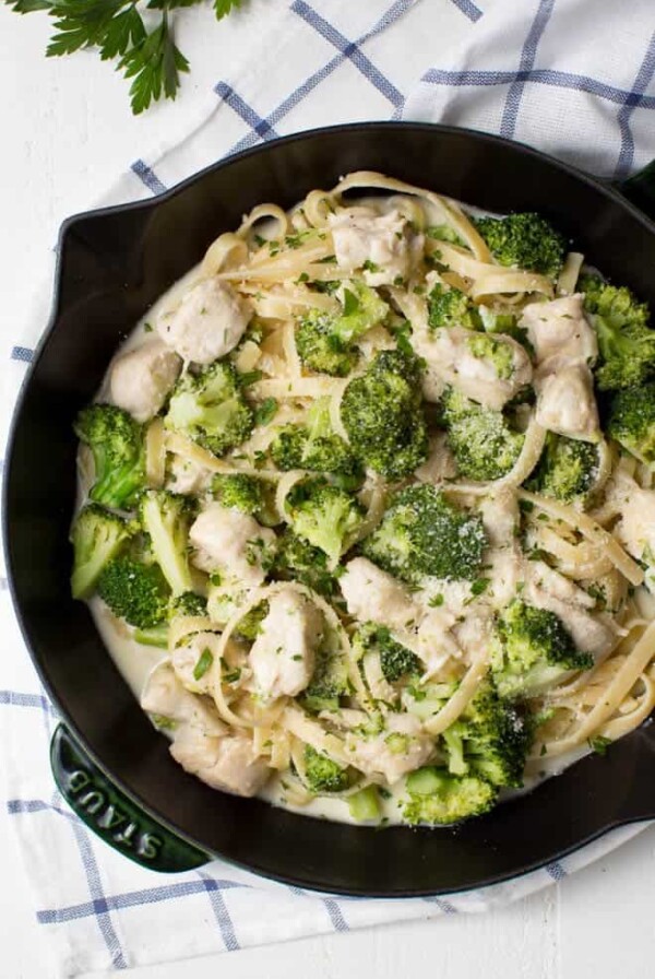 Lightened Up One Pan Chicken and Broccoli Fettuccine Alfredo is a healthier twist on classic chicken Alfredo pasta. It is cooked in one pan and lightened up to make it an easy yet satisfying meal for any day of the week!