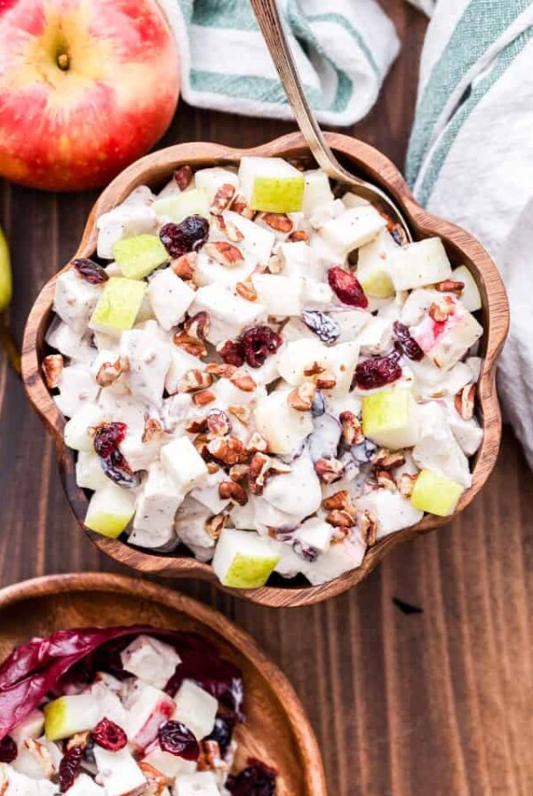 Harvest Chicken Salad is perfect for when you're craving a lighter, healthier meal this fall. Loaded with apples, pears, dried cranberries, pecans and a creamy, tangy Greek yogurt dressing. #chickensalad #fallrecipe #healthydinner #chicken #greekyogurt