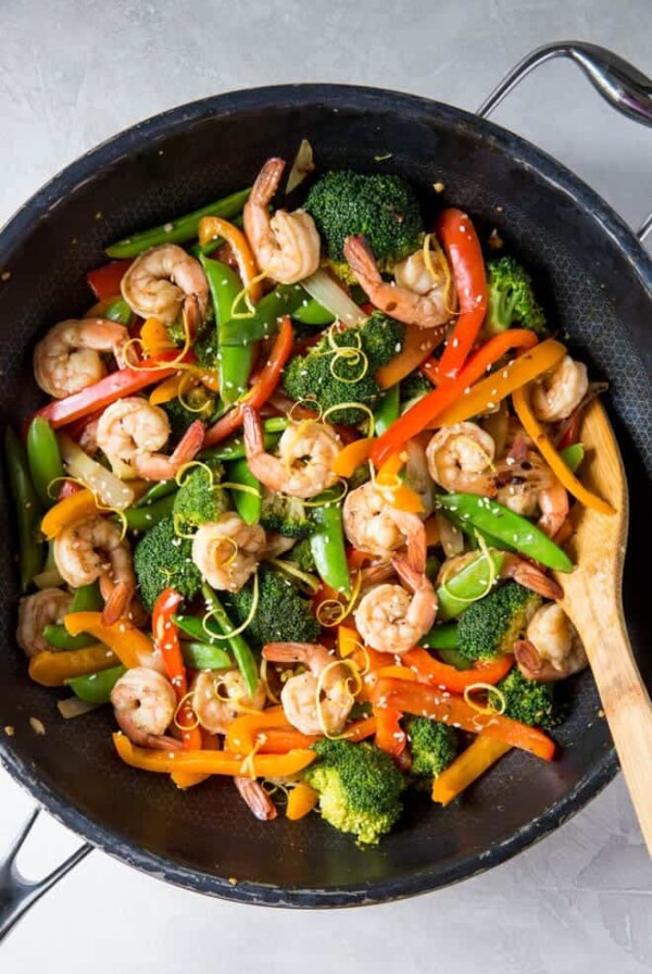 Shrimp Stir Fry with Lemon and Ginger is a simple yet healthy meal for any day of the week. Skip Chinese take out and make this classic at home. #shrimp #lemon #ginger #stirfry #vegetable #recipe #takeout #healthy #dinner #lunch #mealprep