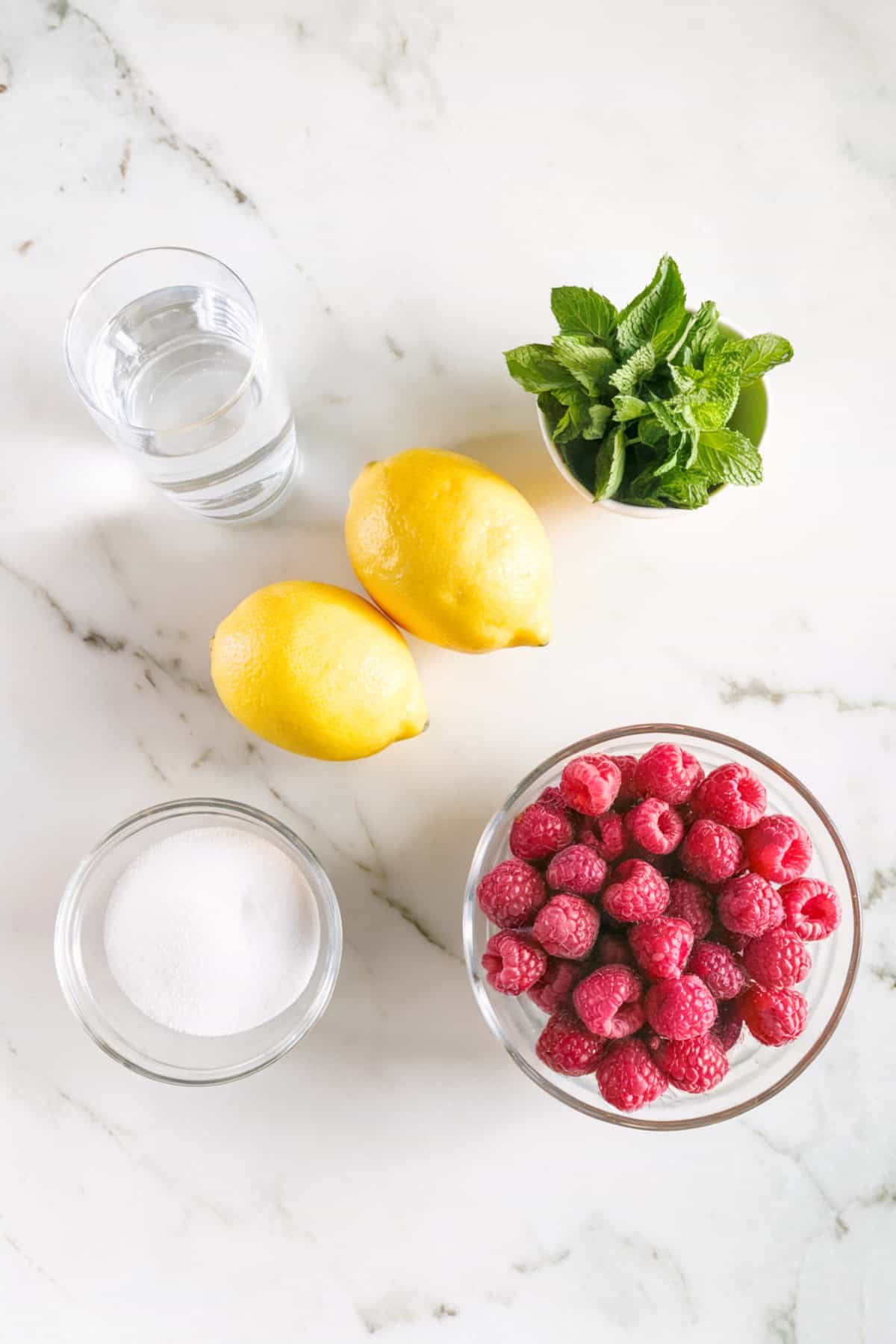 Ingredients for raspberry mint sorbet are water, spearmint, sugar, and raspberries.