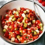 Mediterranean Cucumber and Tomato Salad with Feta in a bowl for serving.