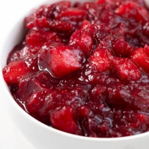 Apple cranberry sauce in a white bowl for serving.