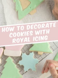 Piping royal icing onto a cookie for decorating.