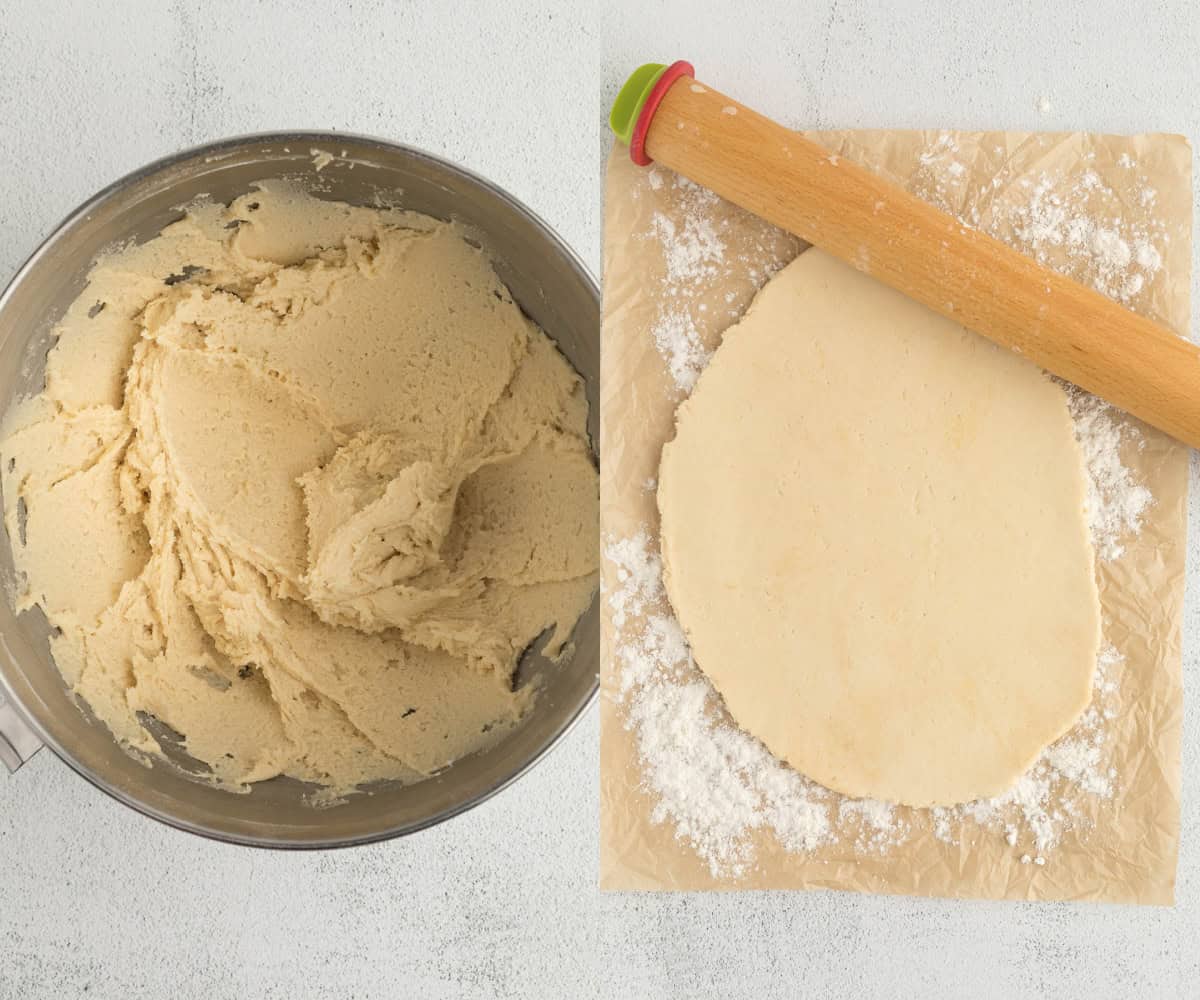 A mixing bowl filled with sugar cookie dough and then the dough rolled out on the side.