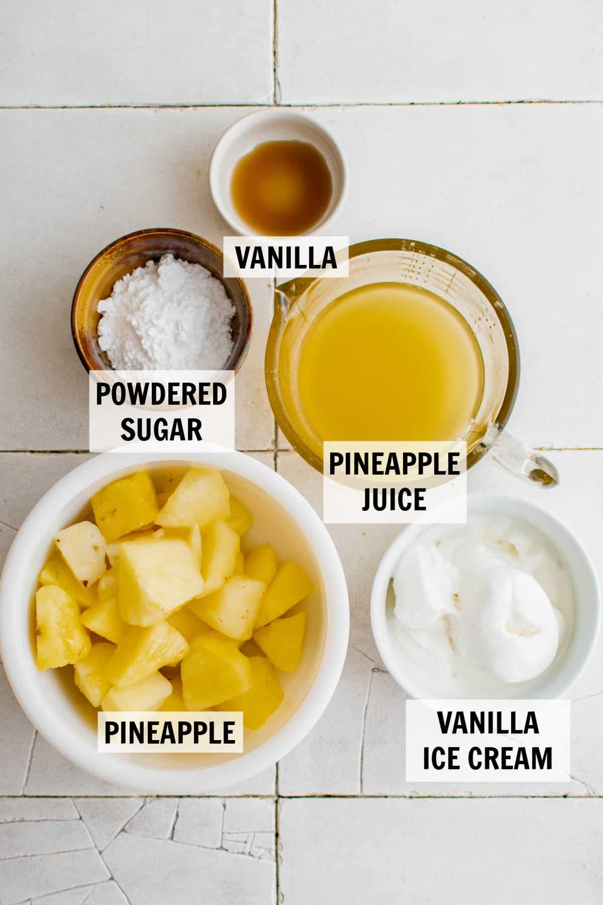 all of the ingredients for dole whip on a tabletop