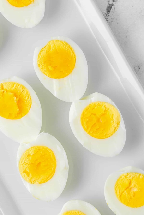 close up photo of sliced boiled eggs