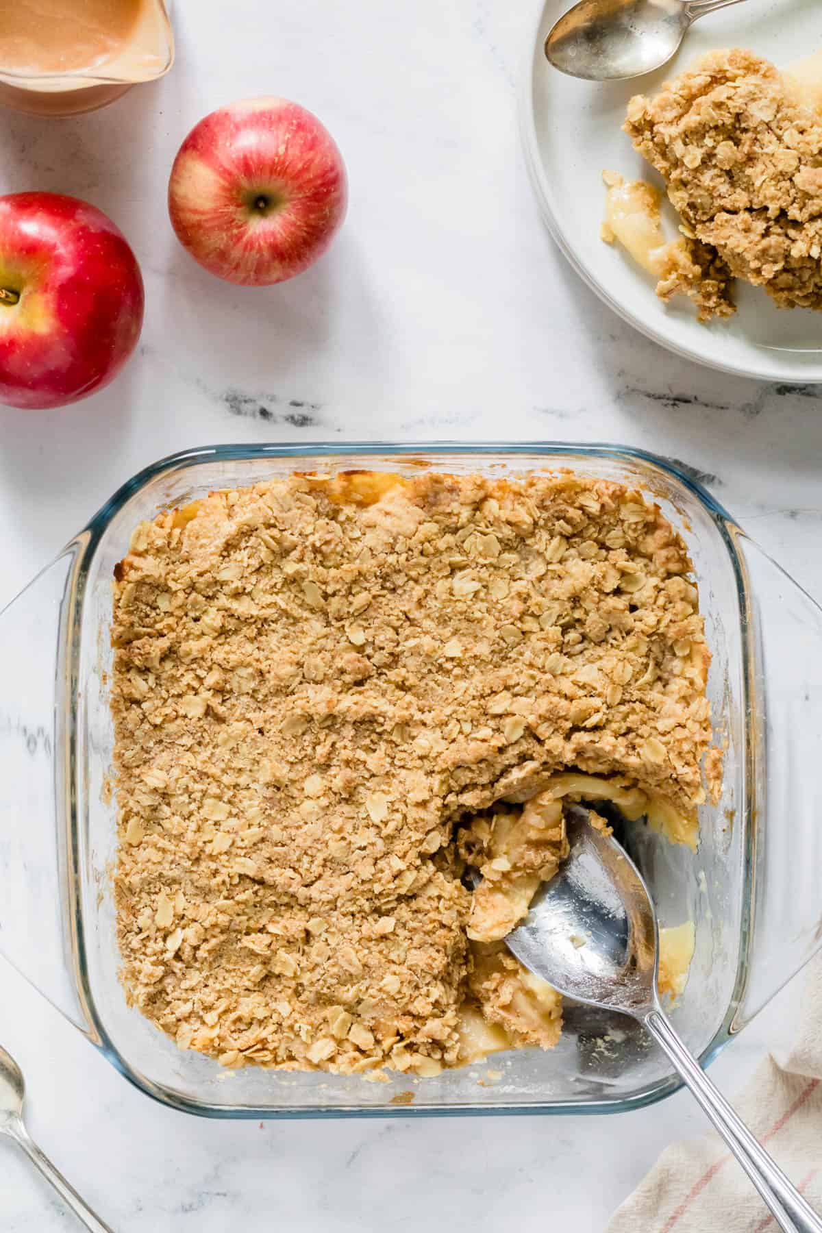 Apple crisp in a square pan after baking.