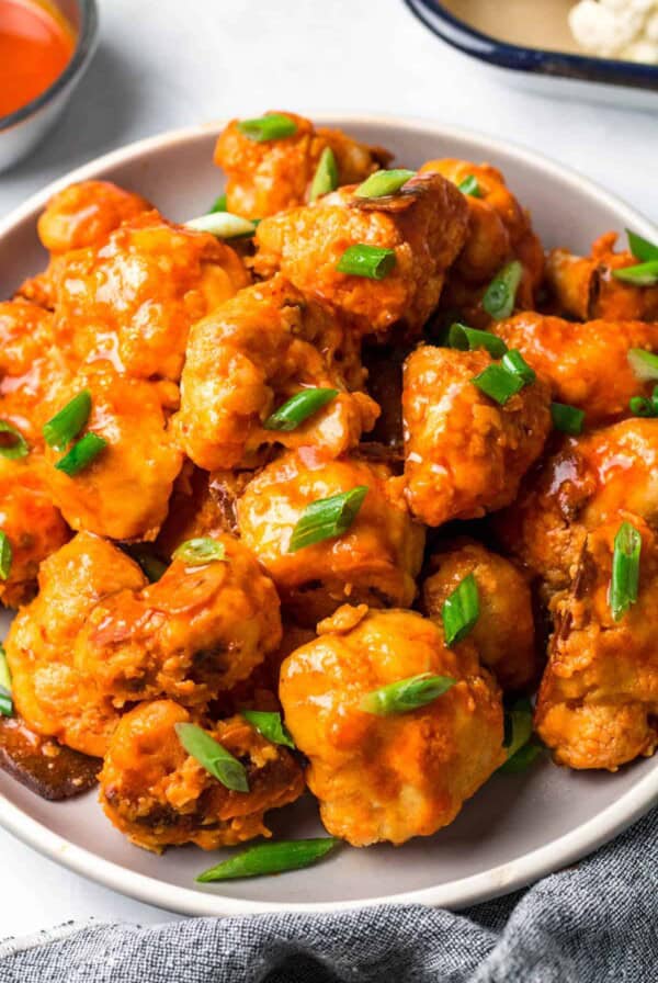 a plate piled high with buffalo cauliflower