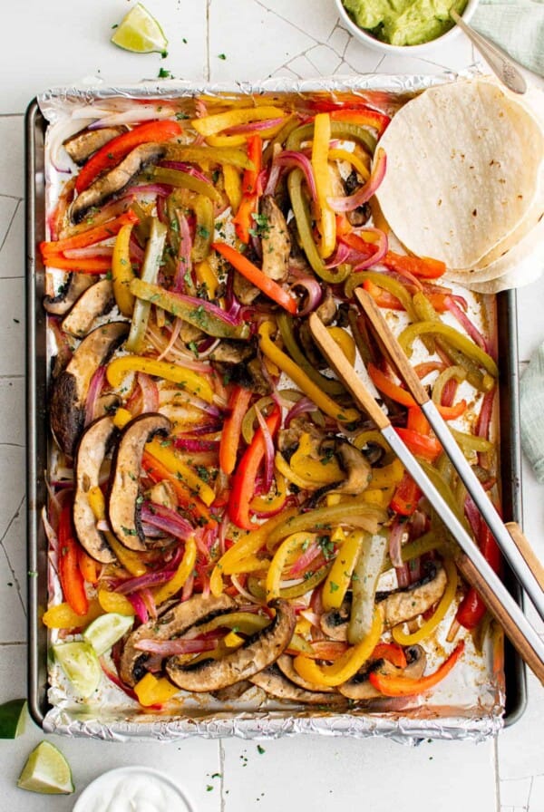 Portobella mushroom fajitas cooked on a sheet pan.