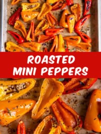 Roasted mini sweet peppers on a sheet pan after roasting in the oven.