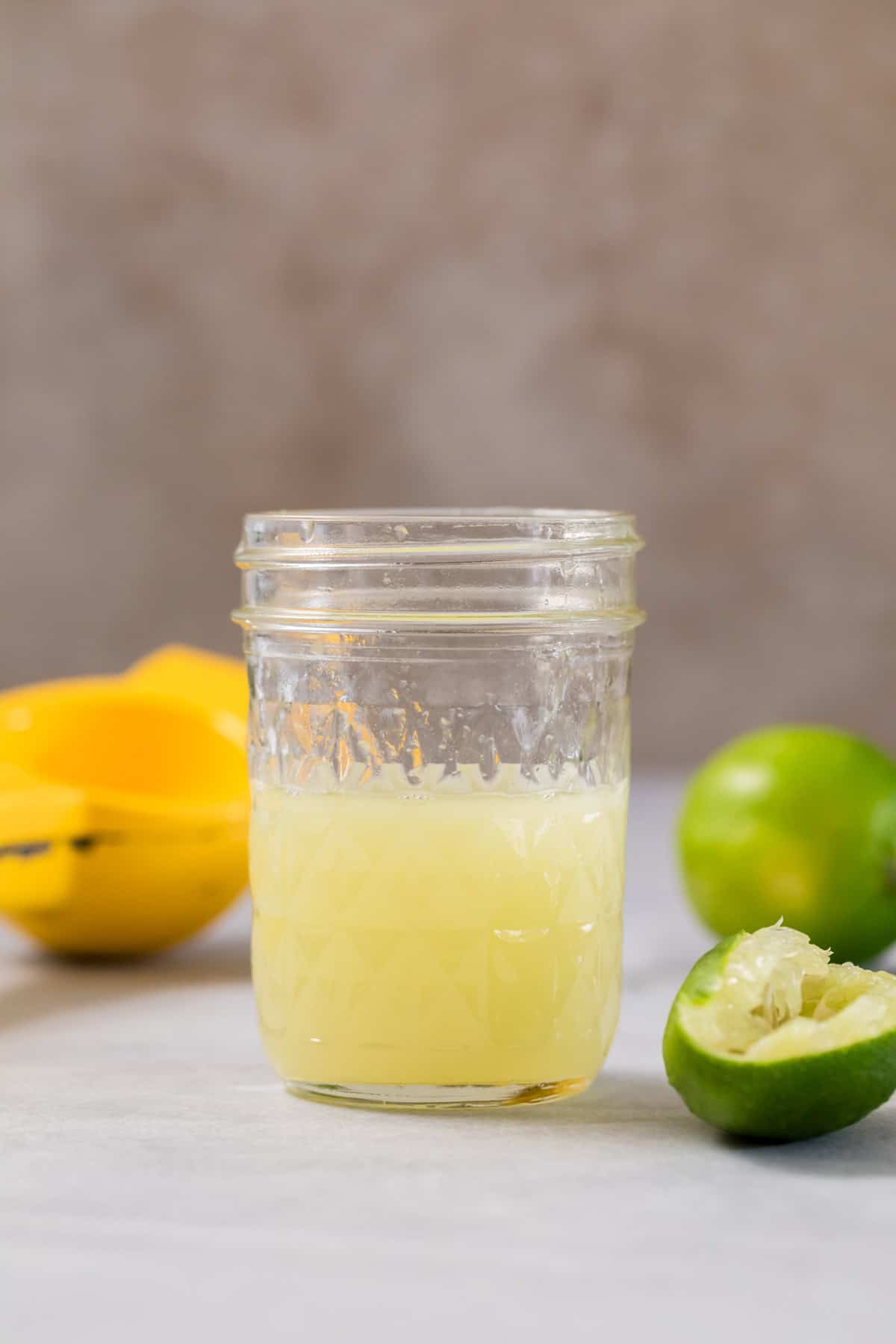 Freshly squeezed lime juice in a small mason jar.